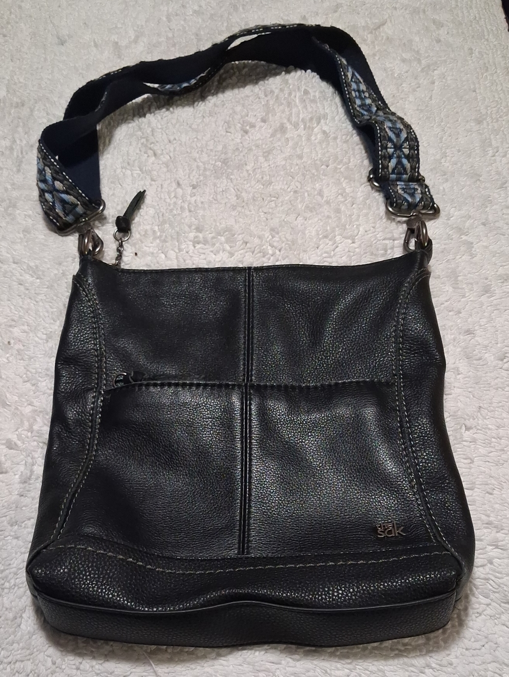The Sak Black Leather Shoulder Bag with Patterned Strap